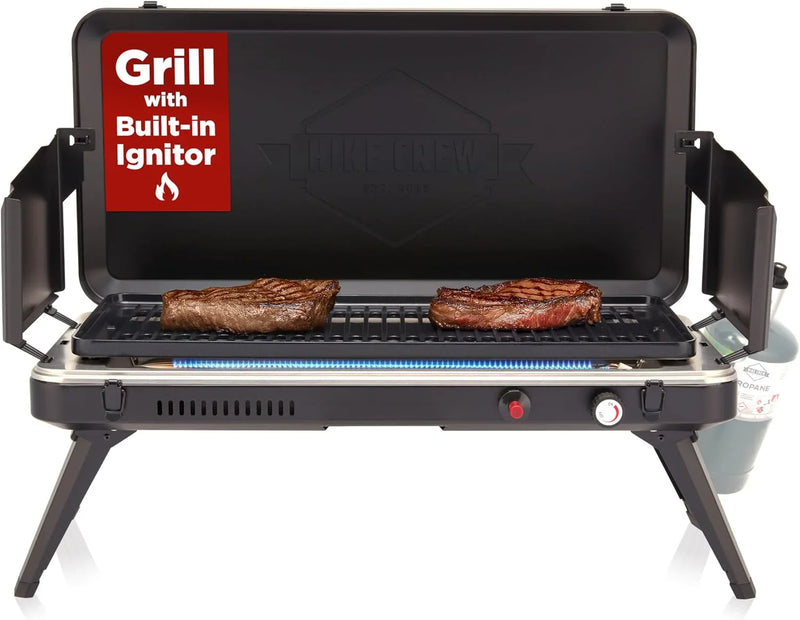 Gas camping barbecue grill | 13,000 watts | Portable liquefied gas burner | Foldable legs and feet | Integrated igniter and built-in regulator (with stainless steel drip tray) | Windproof panel and built-in handle I6