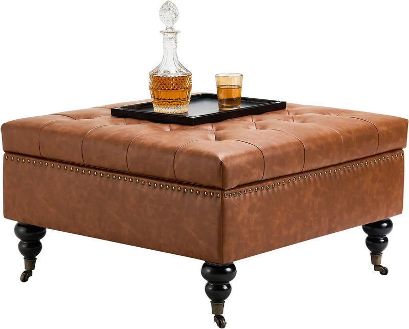 Square leather footstool with storage function, coffee table-style footstool with soft padded raised buttons, equipped with wheels, polyurethane leather high-density sponge, suitable for living room, dormitory, bedroom, in brown color scheme. I5